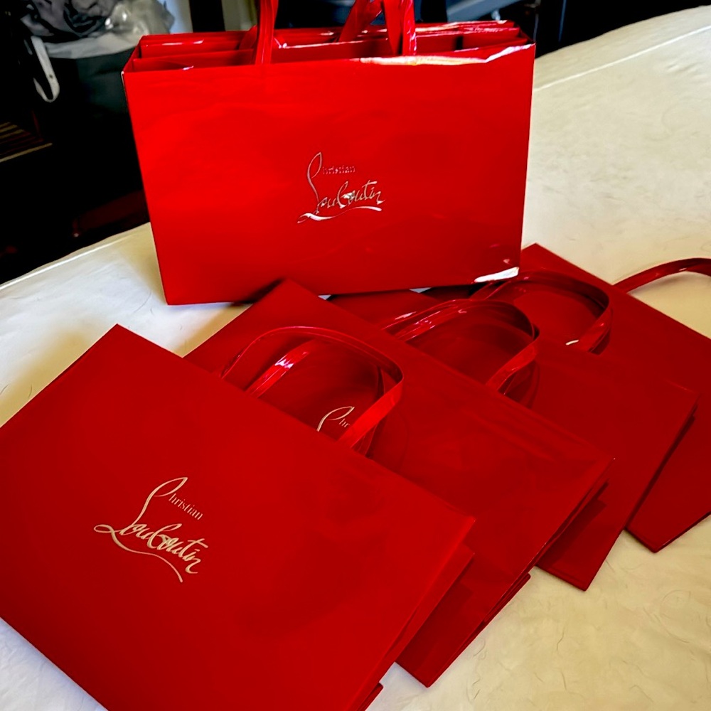 7 never used shopping bags from Christian Louboutin